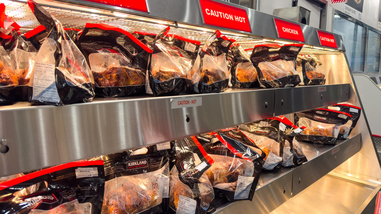 Rotisserie chickens at Costco sitting under the heat lamp.