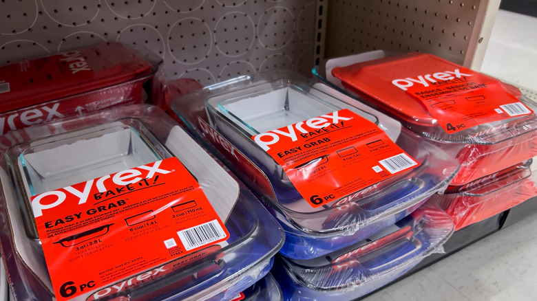 Stacks of Pyrex dishware on a store shelf