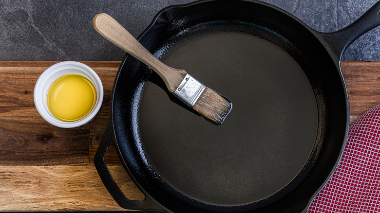 Stop Wasting Olive Oil On Cast Iron: The Budget-Friendly Way To Season It