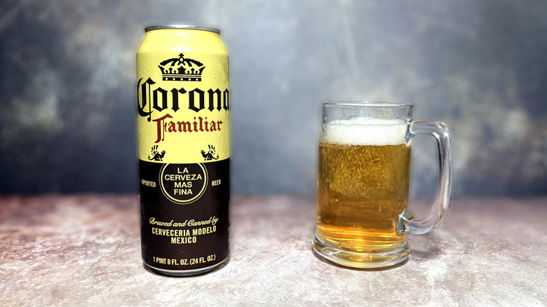 Glass and can of Corona Familiar beer