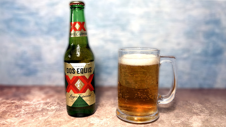Bottle and glass of Dos Equis lager