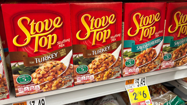 Boxes of red Stove Top Stuffing on a grocery shelf
