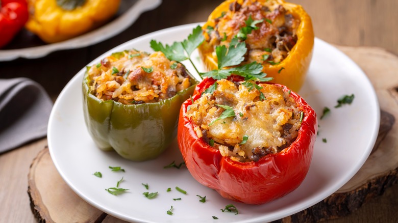 Cooked stuffed peppers on plate