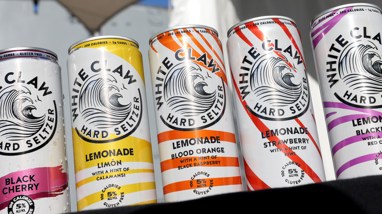 A lineup of White Claw hard seltzer cans