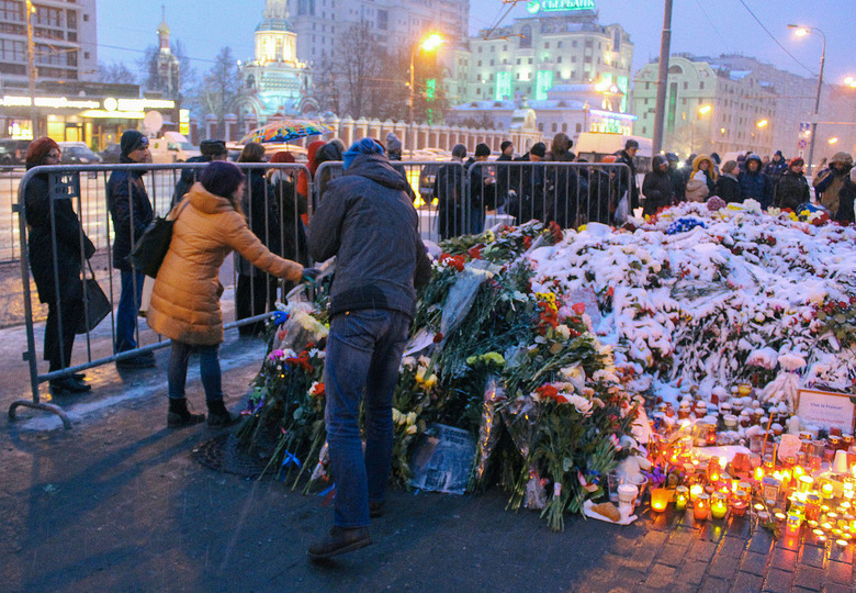 Mourners visit a Paris memorial in November. 