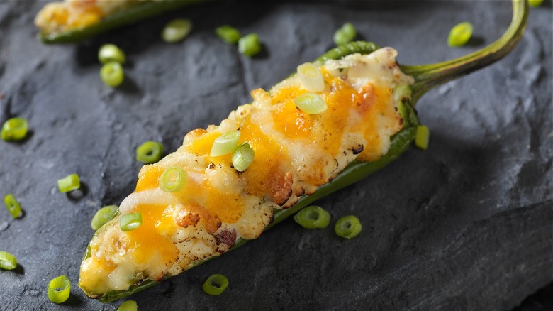 Baked jalapeno with cheese and green onion 