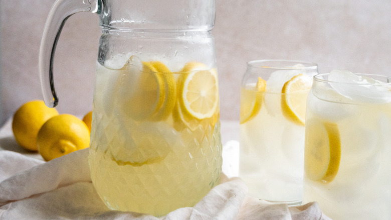 simple and sweet lemonade in a pitcher 