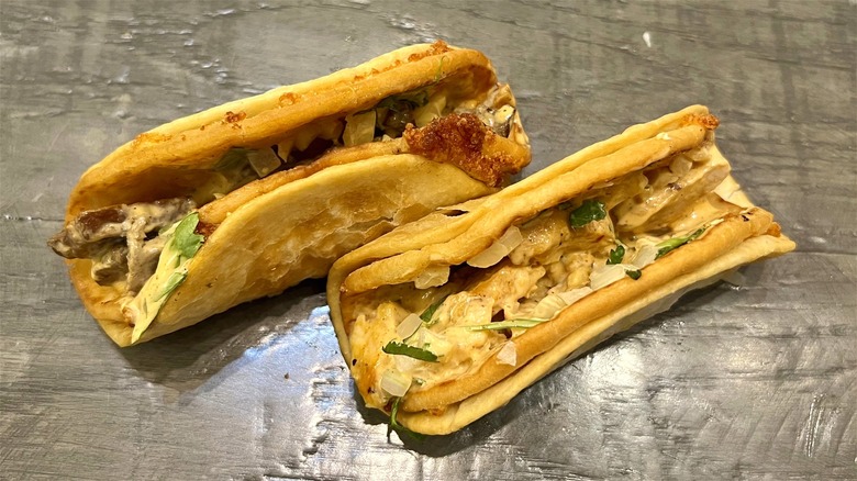 pair of Cheesy Street Chalupas