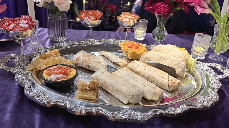 Items from the Taco Bell Luxe Value Menu on a silver platter