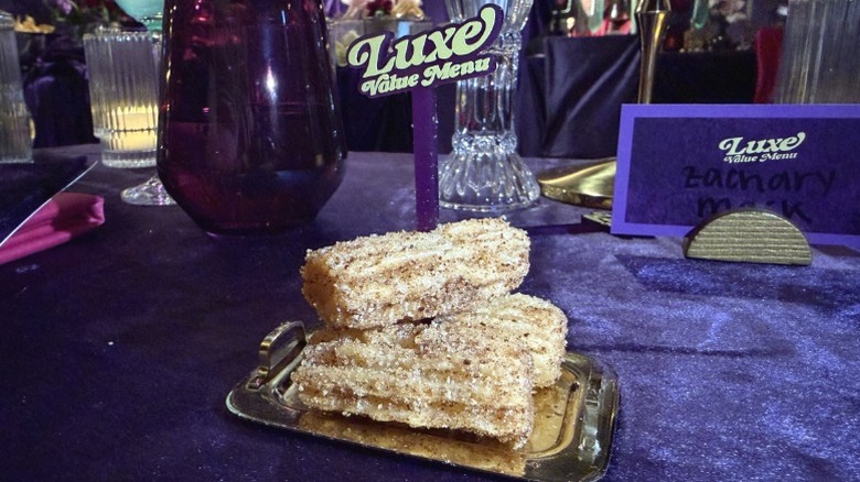 Taco Bell Salted Caramel Churros on a mini silver platter