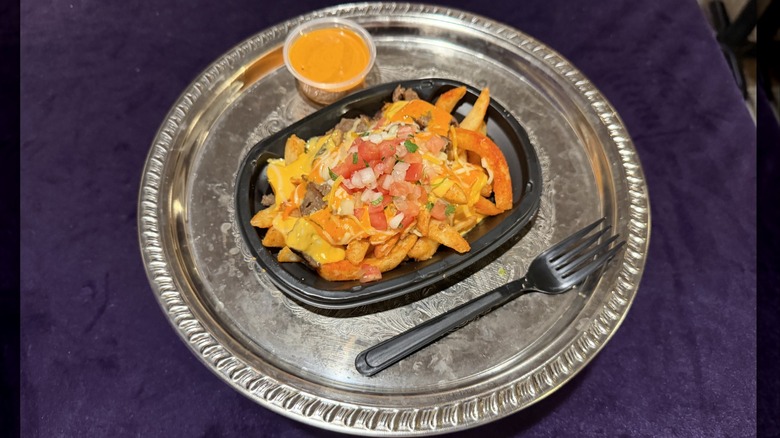 Taco Bell Volcano Steak Fries on a silver platter