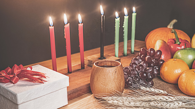 Table set for Kwanzaa with candles