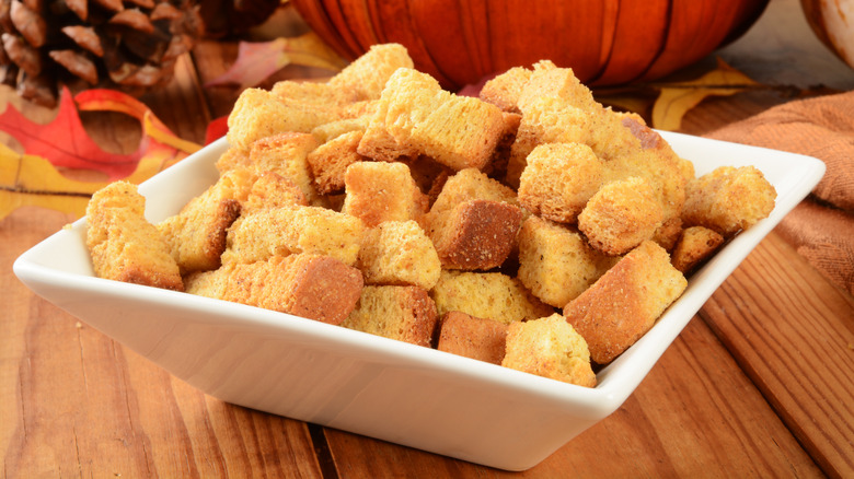 Cornbread croutons in white dish
