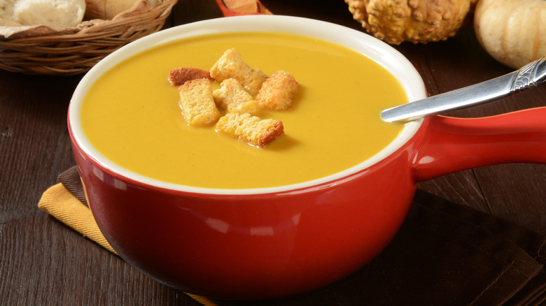 Soup with cornbread croutons on top