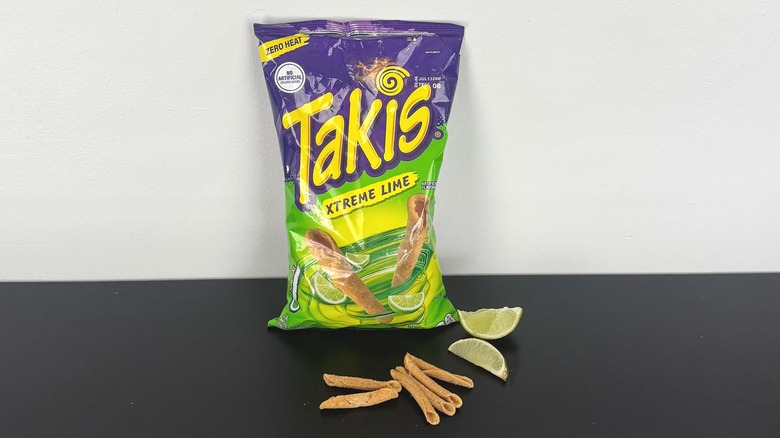 A bag of Xtreme Lime Takis with lime slices