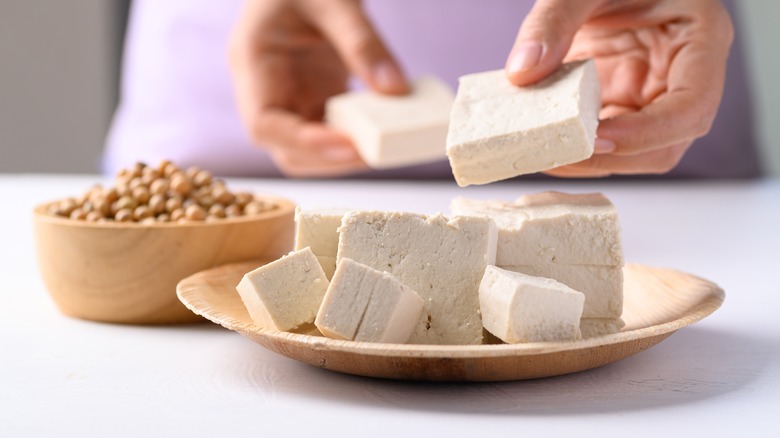 tray of raw tofu cubes