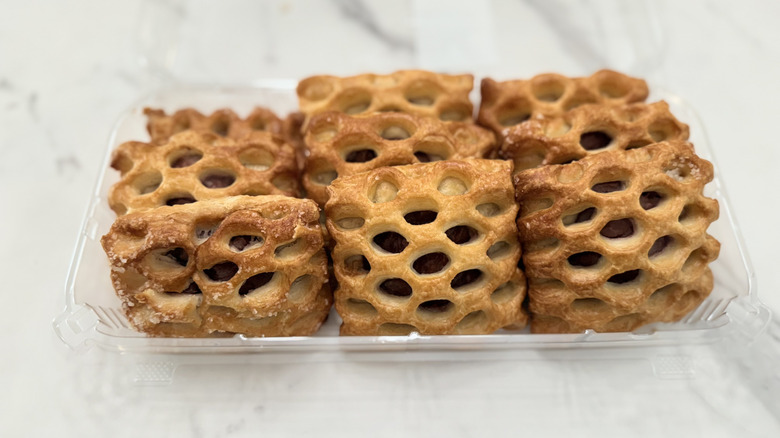 An open container of strawberry rhubarb pastries