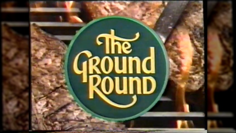 The Ground Round logo over steaks on grill in 1980s TV ad