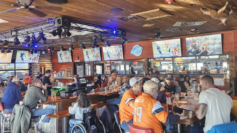 Sports fans inside a Bubba's 33 at the bar on game day