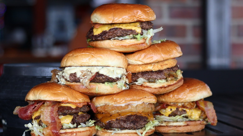 A tower of different types of burgers offered at Bubba's 33