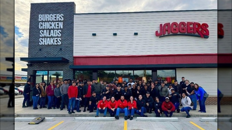 A group of employees sit outside a Jaggers restaurant