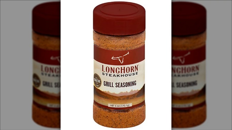 A bottle of Longhorn Steakhouse Grill Seasoning isolated against a white background