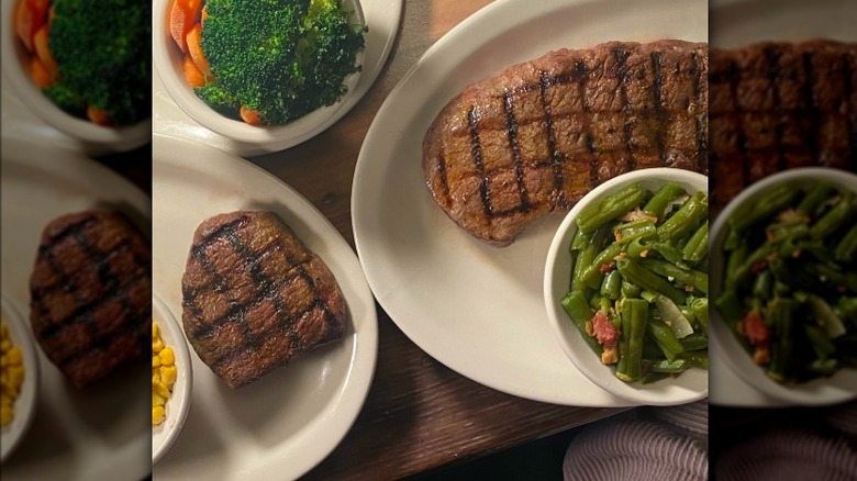 Texas Roadhouse 6 and 8-ounce sirloin steaks on white plates with sides