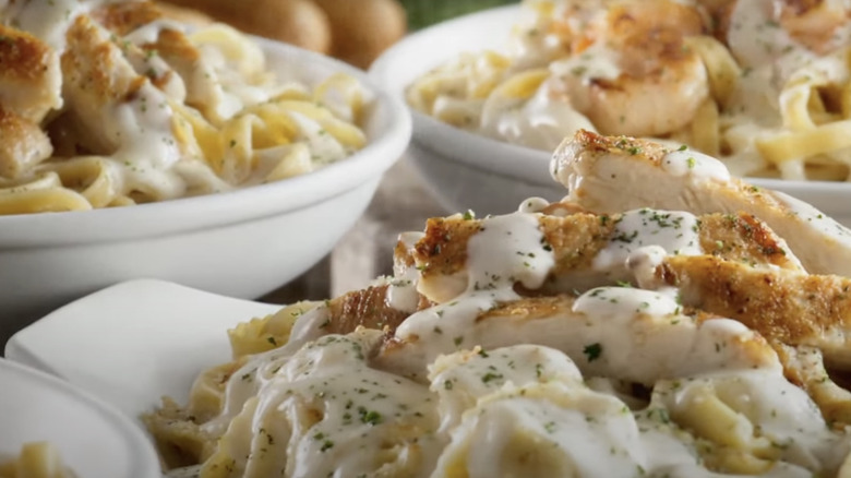 Three dishes from Olive Garden from a commercial.