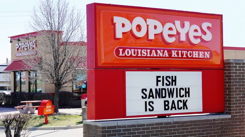 a Popeyes marquee saying that the fish sandwich is back