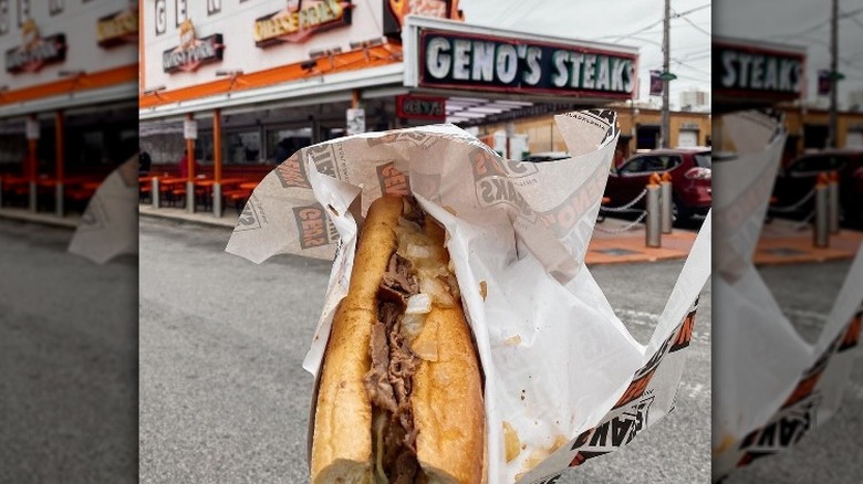 cheesesteak in front of Geno's