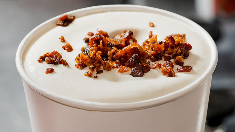 Closeup of Five Guys shake with bacon crumbles on top