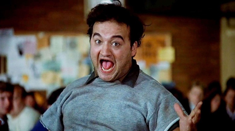 A still from "National Lampoon's Animal House" showing John Belushi initiating its famous food fight scene