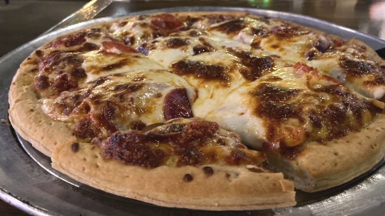 A pepperoni pizza, served at Papa Passero's