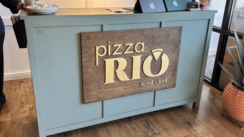 The front desk at a Pizza-Rio restaurant