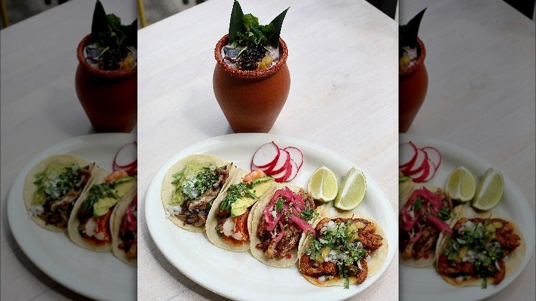tacos radishes limes on plate