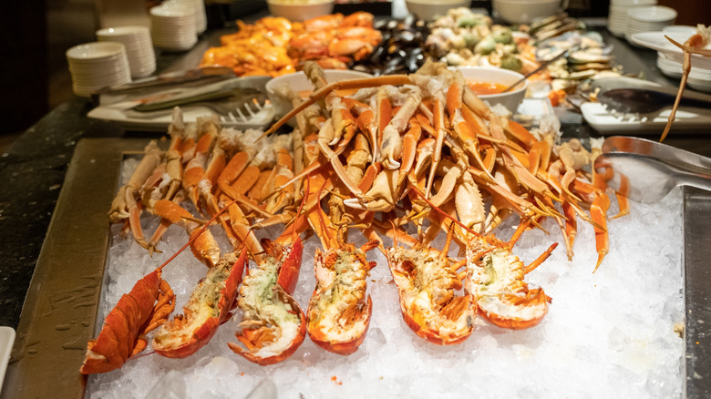 A seafood buffet display, with lobster and crab legs