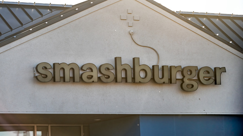 The Smashburger logo, as seen outside his store