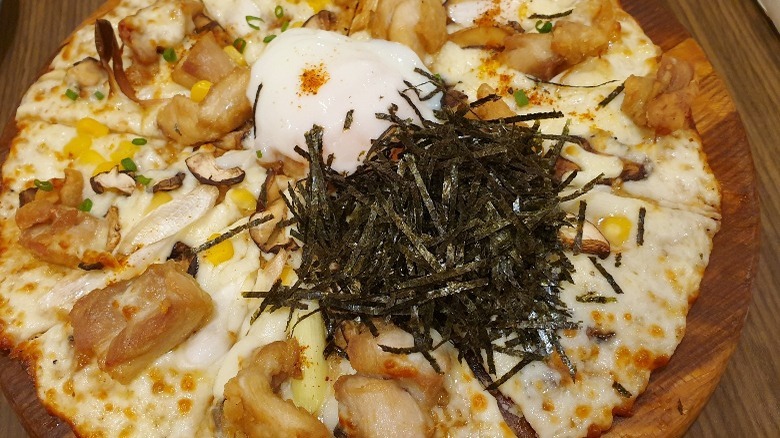 Pile of kombu on pizza