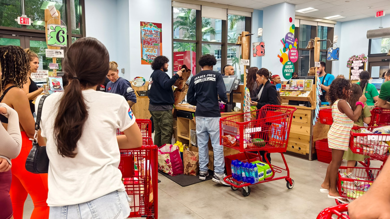 Cutomers wait in line at a Trader Joe's