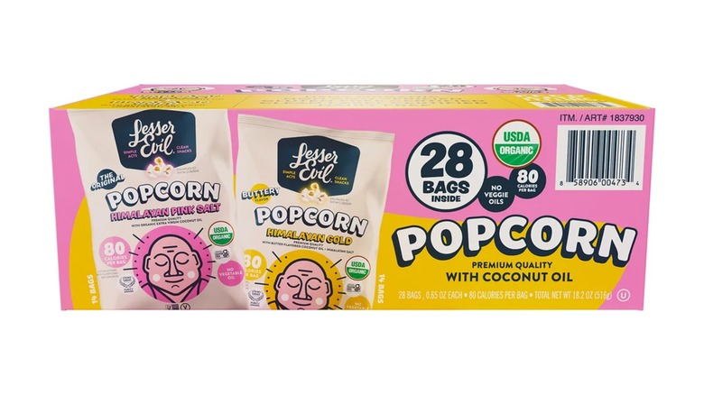 A yellow and pink box of LesserEvil Organic Himalayan Popcorn with Coconut Oil