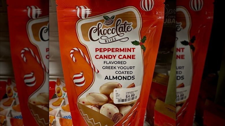 Red package of Peppermint Candy Cane Flavored Greek Yogurt Coated Almonds