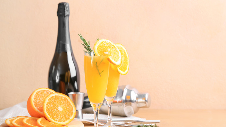Champagne bottle and mimosas