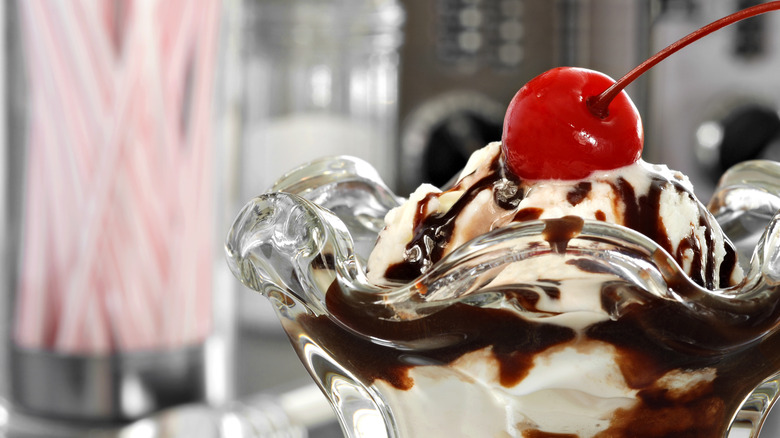 ice cream sundae with hot fudge and cherry