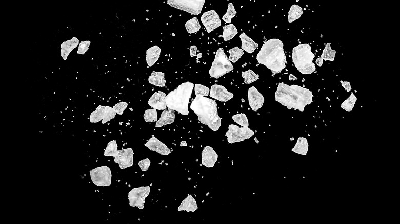 Salt crystals on black brackground