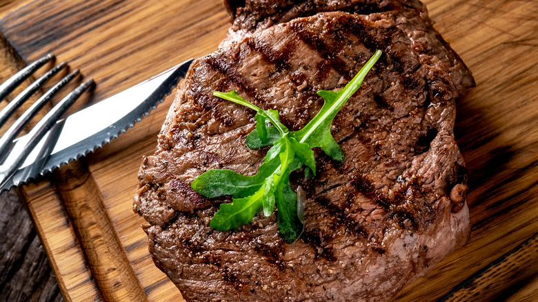 Grilled chuck steak on board