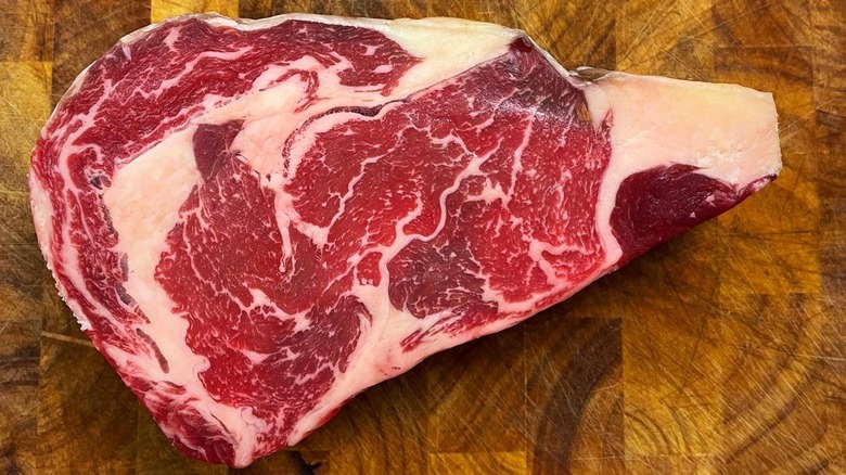 Delmonico steak on cutting board