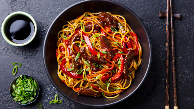 Beef stir-fry with chopsticks
