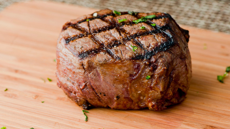 Filet mignon on cutting board