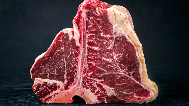 Raw porterhouse steak