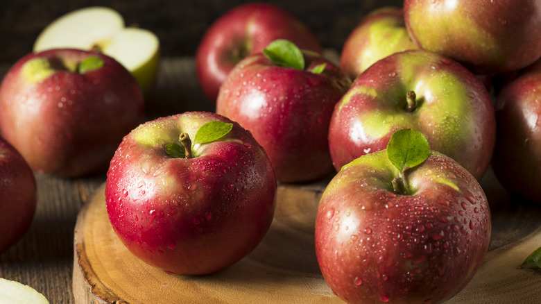 McIntosh apples on wooden board